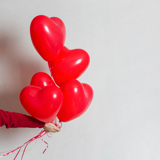 Set of 20 Wukusy heart-shaped rainbow latex balloons for birthday, anniversary, or wedding party decorations.