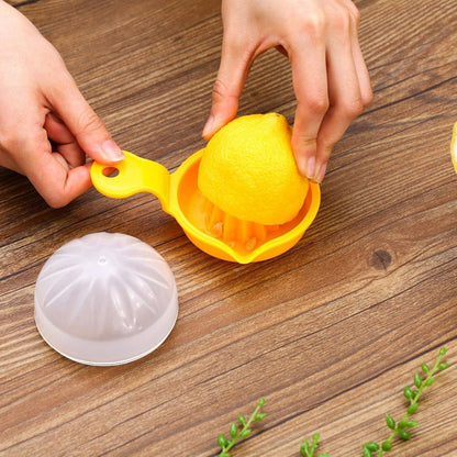 Yellow Wukusy manual citrus juicer for lemons and oranges, hand-operated squeezer for home use, shown in image.