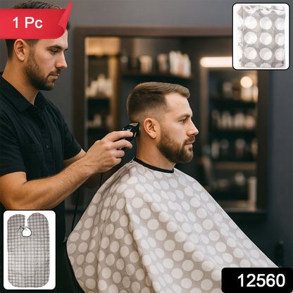 Wukusy professional hair cutting cape draped over a salon chair, made of lightweight, durable material for hairdresser use.