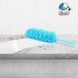 Ekom microfiber feather duster for cleaning with soft, fluffy feathers and a sturdy handle for dusting furniture and surfaces.