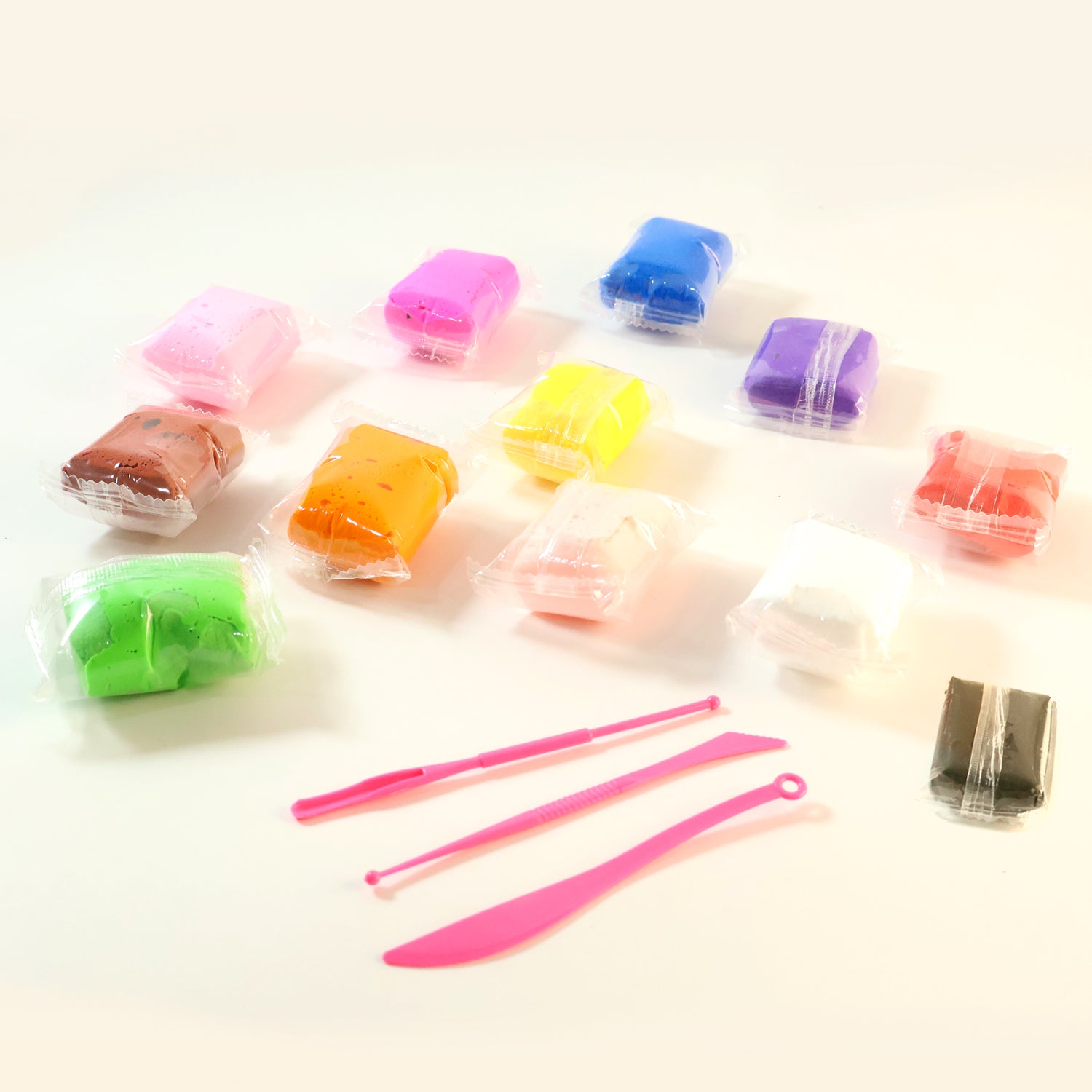 Kids' Wukusy 12-color antibacterial super clay set for creative play, featuring vibrant clay blocks in a playful display.