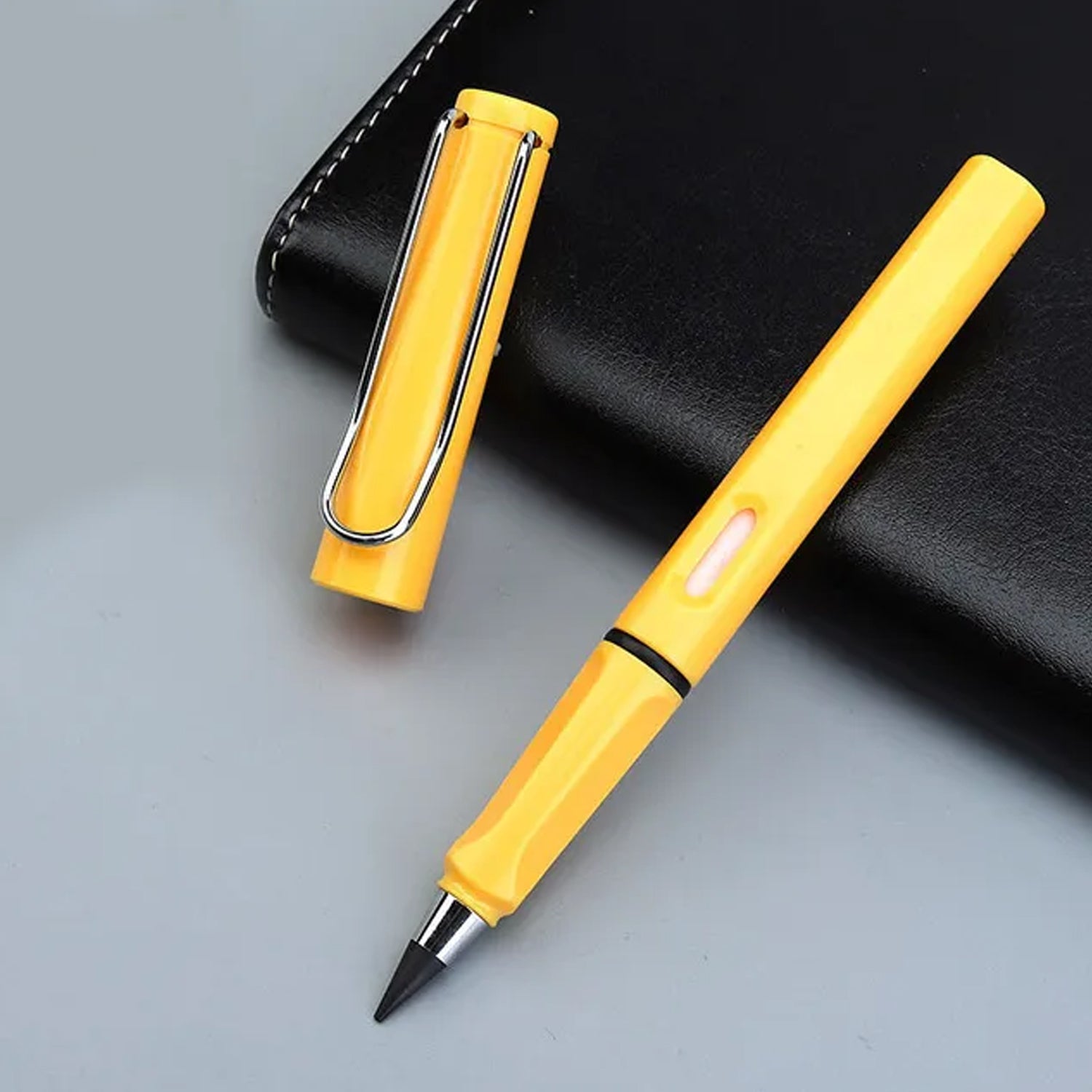 Wukusy 2-in-1 everlasting inkless pencil with replaceable head and eraser, portable reusable magic pencil for kids and stationery.