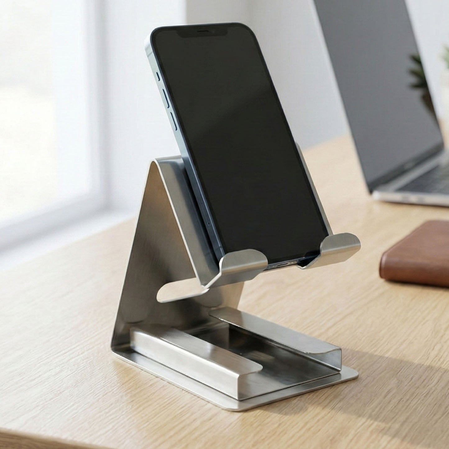 Wukusy premium desktop mobile phone stand holder for smartphones, black, adjustable design, on a wooden surface.