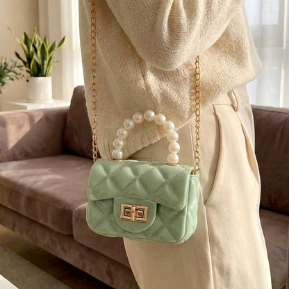 Wukusy elegant quilted mini sling handbag with top handle and adjustable strap, stylish fashion accessory for women