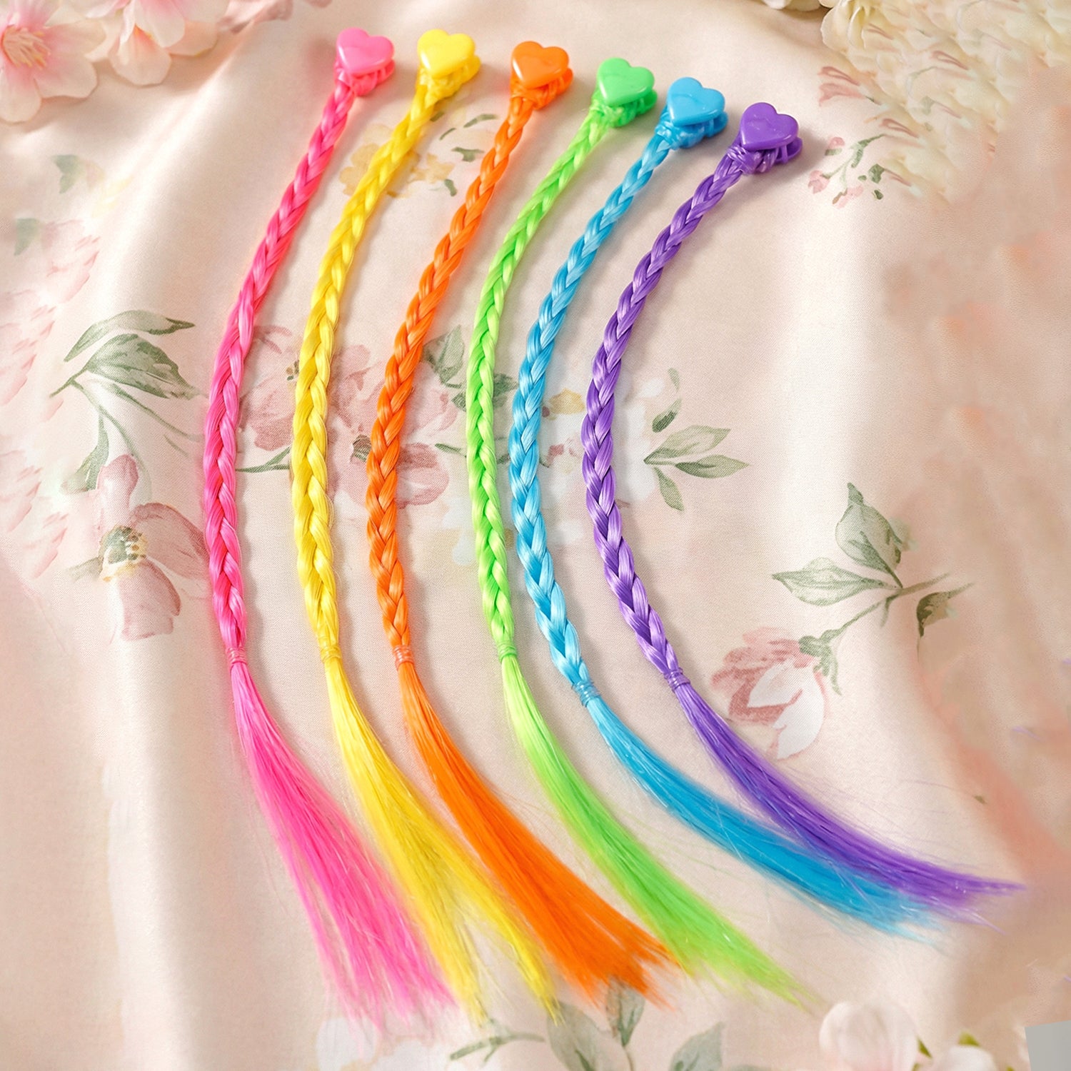 Colorful braided hair extension streaks for girls and kids, featuring six vibrant strands by Wukusy, displayed in the image.