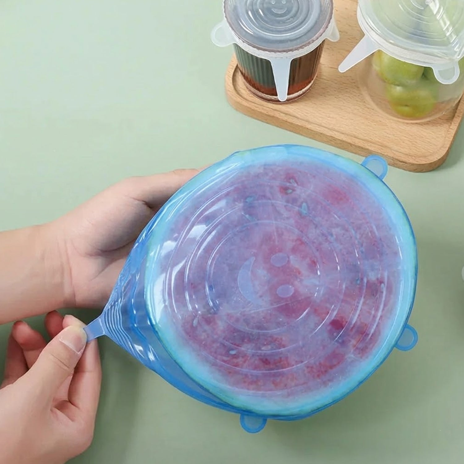 Set of four reusable silicone stretch lids by Wukusy, flexible covers fitting various bowl and container sizes.