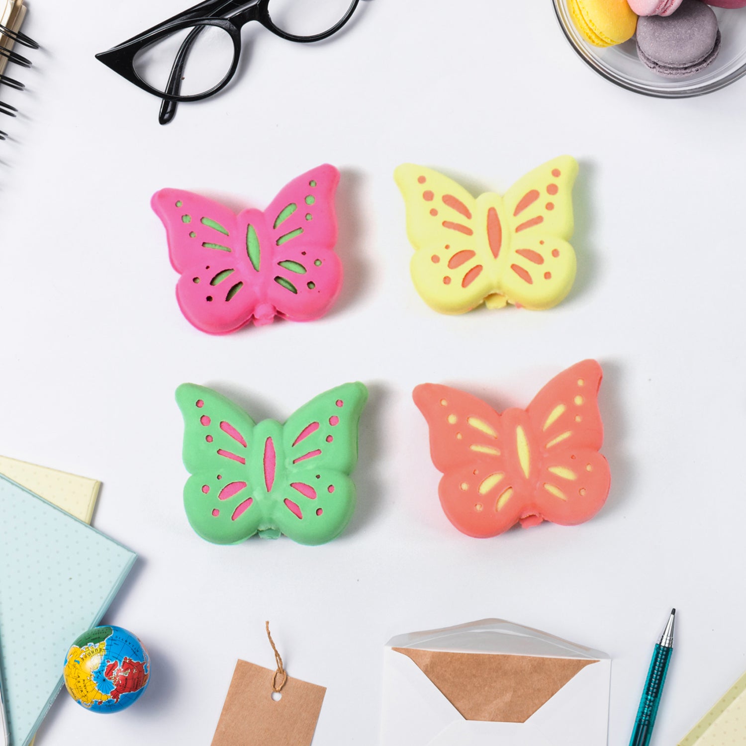 Colorful butterfly-shaped rubber eraser from Wukusy, ideal for office use, with vibrant mixed colors and detailed butterfly design.