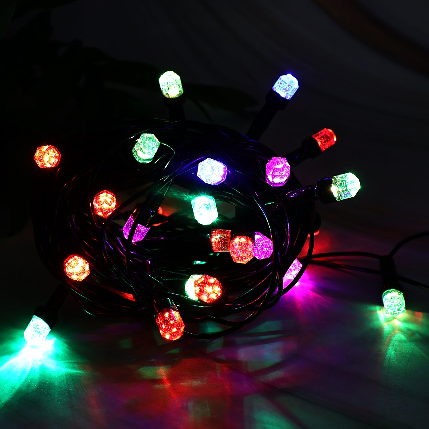 Wukusy 8-meter LED decorative string fairy lights for home decor, with warm white glowing bulbs on a flexible wire.