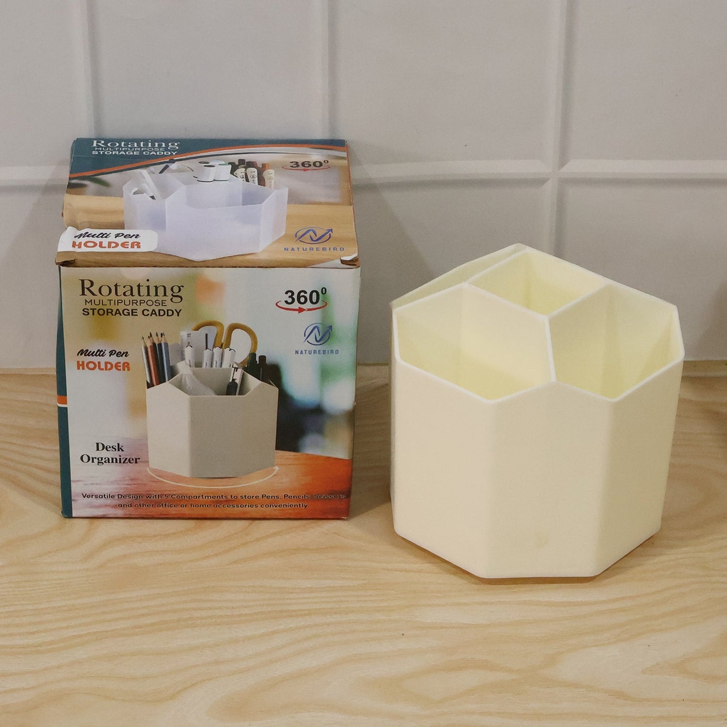 Wukusy 360-degree rotating desk organizer with multiple compartments for keeping workspace tidy and organized.