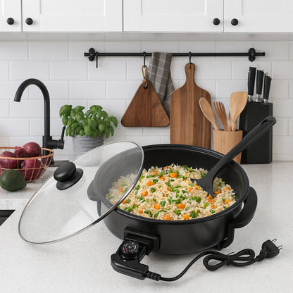 Wukusy Orbit Electric Multi-purpose Cooker with 1500W, featuring a sleek design and control panel for versatile home cooking.