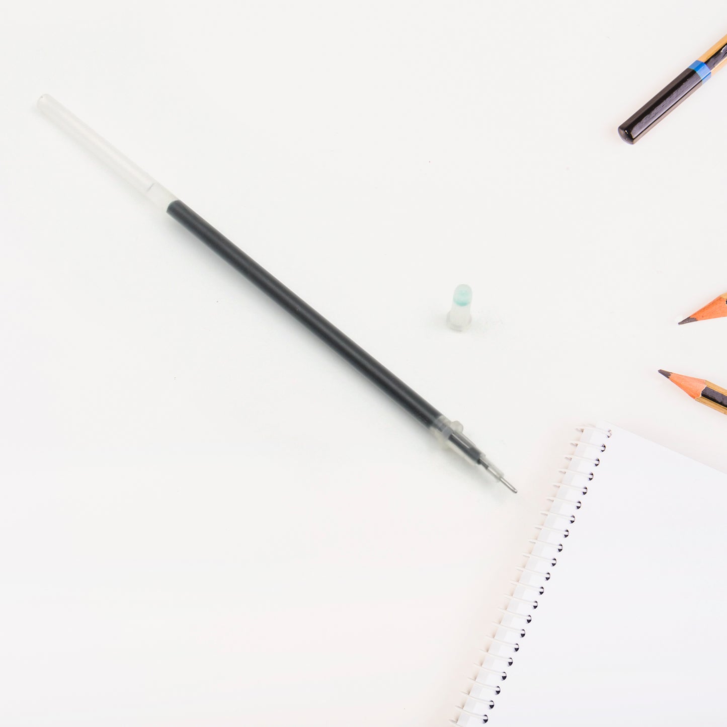 Wukusy black ballpoint pen refill for smooth writing, compatible with all-round office pens, shown in a pack of 10.