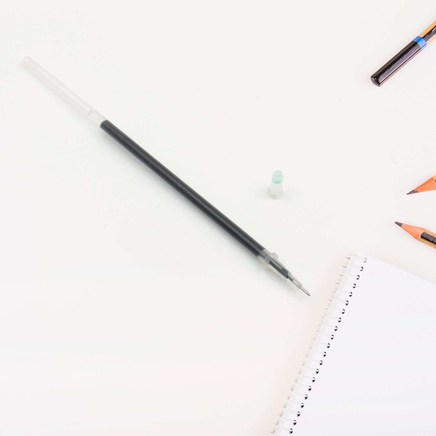 Wukusy black ballpoint pen refill for smooth writing, compatible with all-round office pens, shown in a pack of 10.