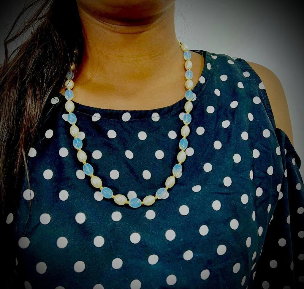 Drpshippr PD Enterprise MALA pearl and gold-plated necklace with intricate design and hanging pearl accents.
