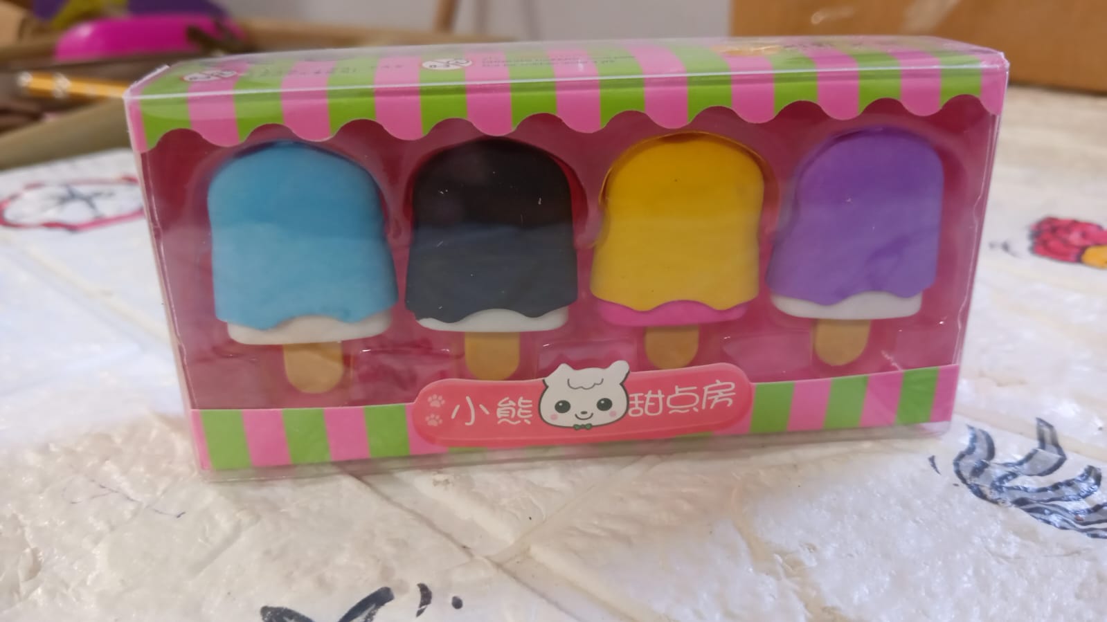 Wukusy ice cream-themed eraser set for girls, includes doughnut, lollipop, and ice cream shape erasers, perfect for school supplies.
