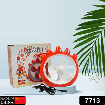 Wukusy 7713 mini desktop rechargeable fan with adjustable blades, compact design, suitable for home, office, or car use.
