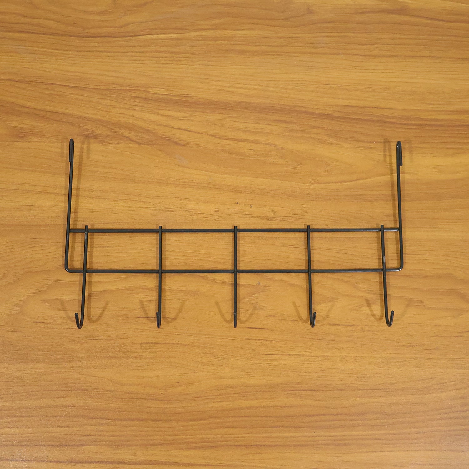 Wukusy premium over-the-door metal hook rack with five hooks for hanging coats, hats, and accessories in a home or office.