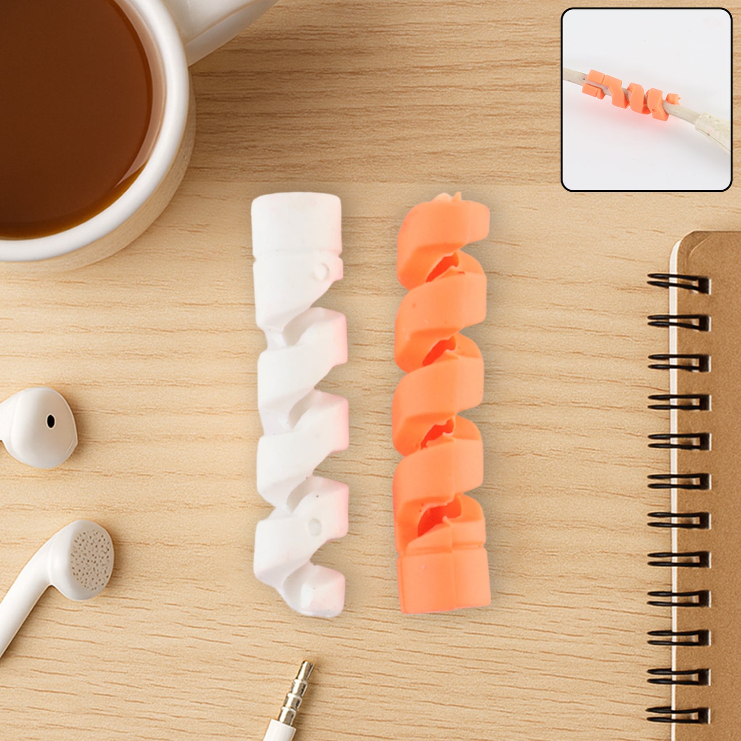 Wukusy anti-fray spiral cable protector set for mobile accessories, showing two black flexible protectors on charging cables.