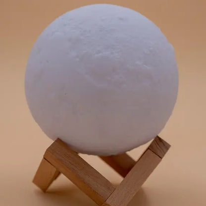Wukusy 3D 2-in-1 LED moon lamp and aroma diffuser for office use, featuring printed moon design and ambient lighting.