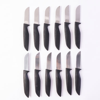 Wukusy 12-piece kitchen knife set with ergonomic stainless steel chef knives arranged on a countertop.