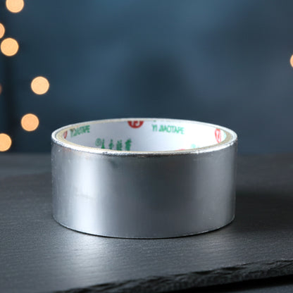 Wukusy heavy-duty aluminium foil adhesive tape, 8540 mm length, shown in a roll ready for sealing and insulation tasks.