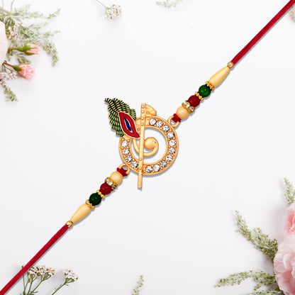 Wukusy Krishna Flute Rakhi with stone-studded peacock feather design, featuring intricate fashion accessories and vibrant decorative details.