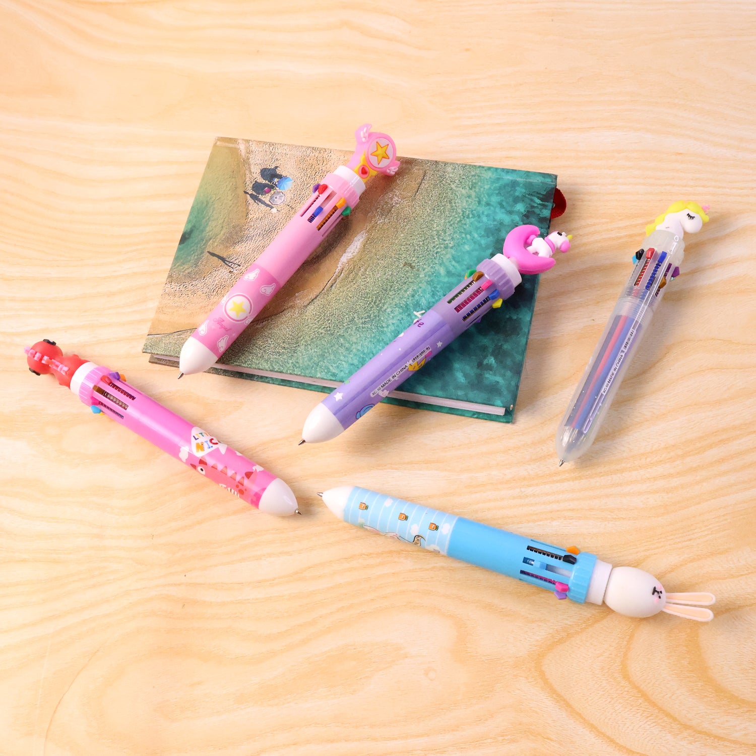 Wukusy cute character design 10-in-1 multicolor ball pen with colorful ink and playful character illustrations