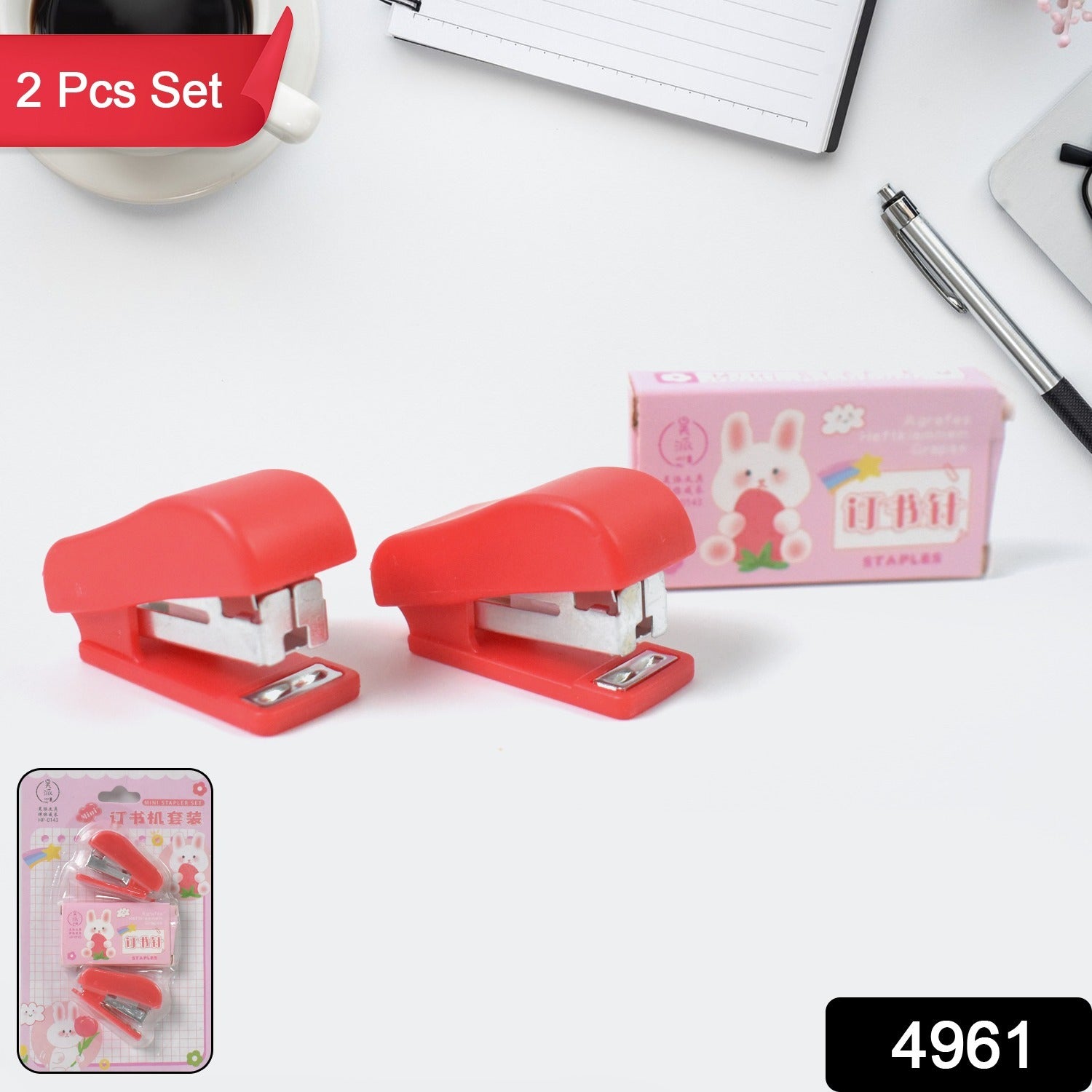 Wukusy mini office stapler with staples and pin set, compact desktop office supply for quick paper fastening.