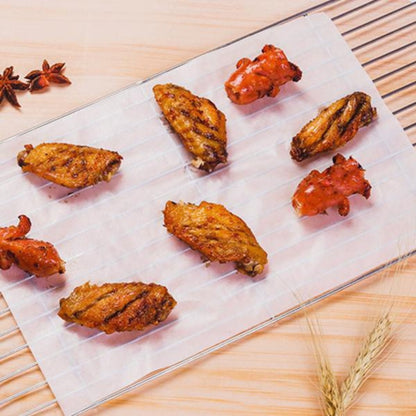 Wukusy 2599 Oil Absorbing Sheets cooking paper with absorbent surface for grease and oil removal in food preparation.