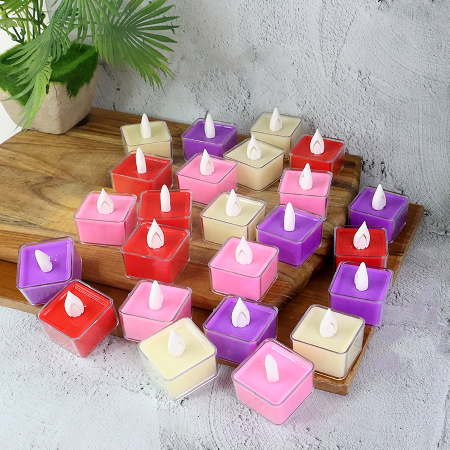 Set of 24 multi-color LED tealight candles by Wukusy, ideal for home decor with vibrant, flickering light effects.
