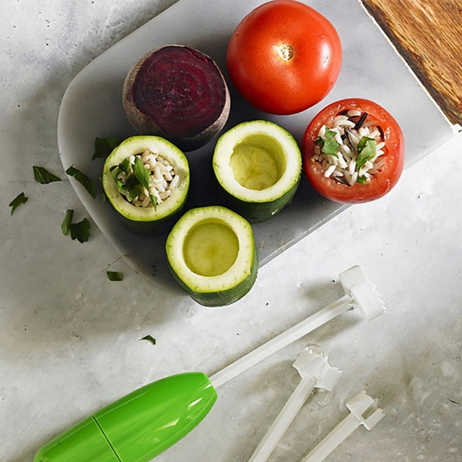Wukusy Veg Drill vegetable spiralizer kitchen tool with handle and spiral blades for stuffing vegetables and creating vegetable spirals.