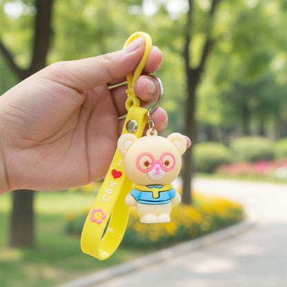 Cute cartoon bear silicone keychain by Wukusy featuring a colorful, soft bear design on a keyring.