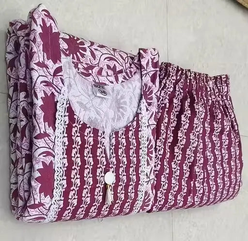 Women’s purple cotton kurti set with maroon pants, floral print, three-quarter sleeves, suitable for daily wear, by Ekom.
