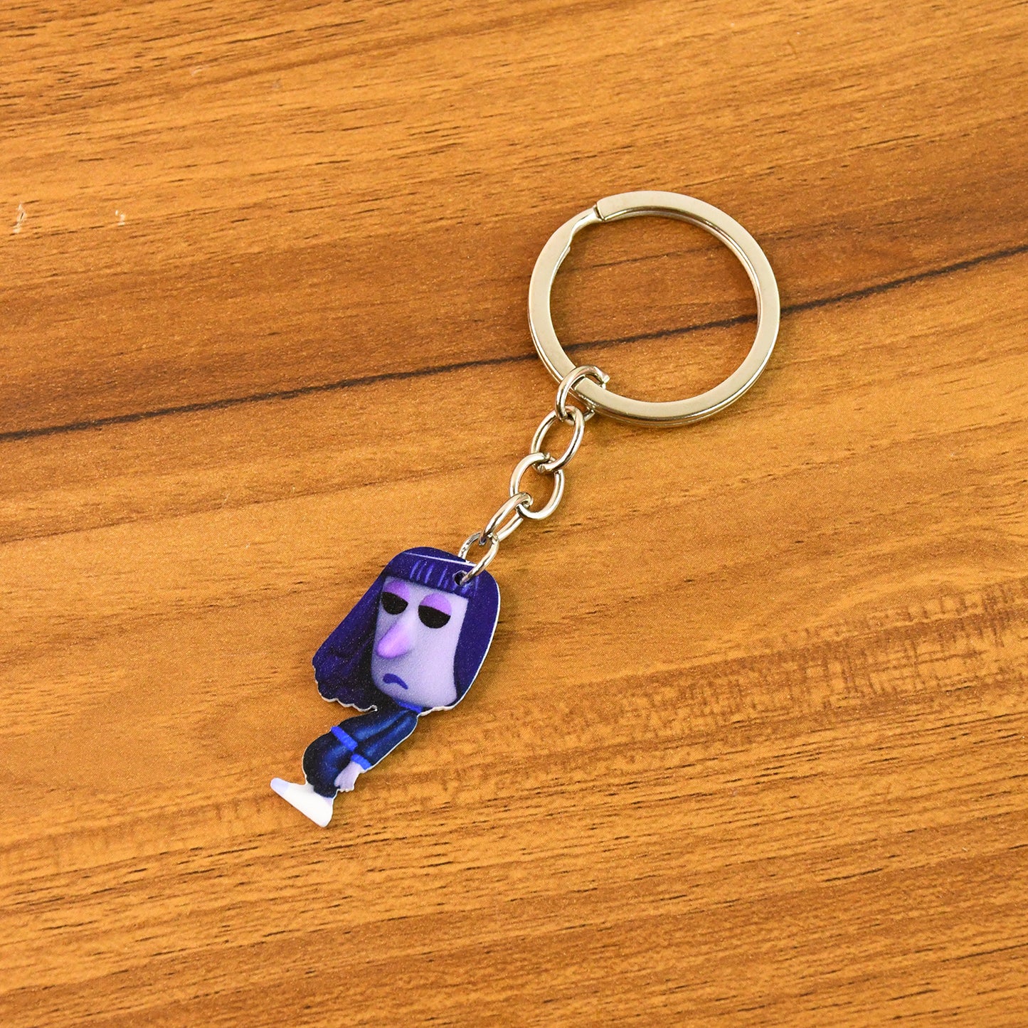 Wukusy cartoon-themed character keychain, large size, fun home decor accessory with colorful, playful design, hanging from a hook.