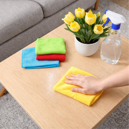 Wukusy microfiber cleaning cloths 4-pack set, soft and absorbent towels for multipurpose cleaning and polishing surfaces.