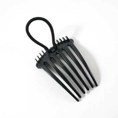 Wukusy volumizing hair bun comb clip, a black hair accessory for creating full, secure bun hairstyles.