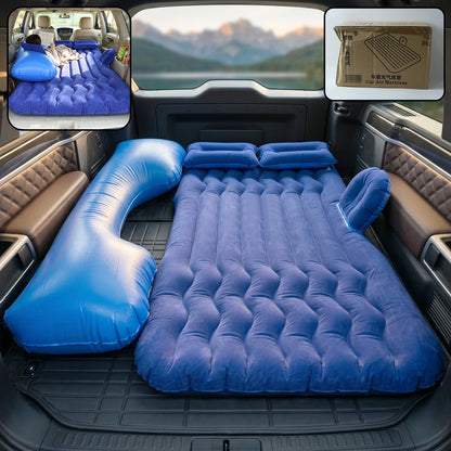 Dark blue Wukusy portable car air mattress bed set with pump and pillows, fully inflated and ready for use inside a vehicle.