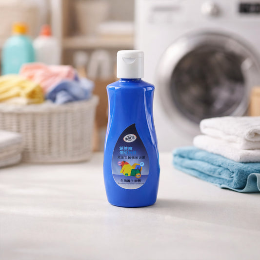 Wukusy multipurpose liquid laundry stain remover bottle, 100 ml, designed to remove stains from clothing effectively.