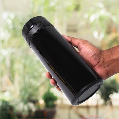 Stainless steel vacuum thermos flask bottle by Wukusy, 700ml capacity, with a sleek insulated design and secure lid.
