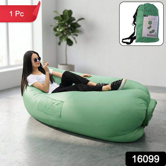 Wukusy foldable inflatable lounger air sofa laid out outdoors, showcasing its portable, lightweight design and comfortable fabric surface.