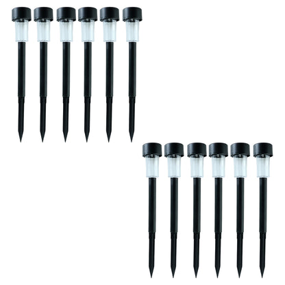 Wukusy solar-powered lawn pathway light set with 12 black stake lights illuminating a garden pathway at dusk