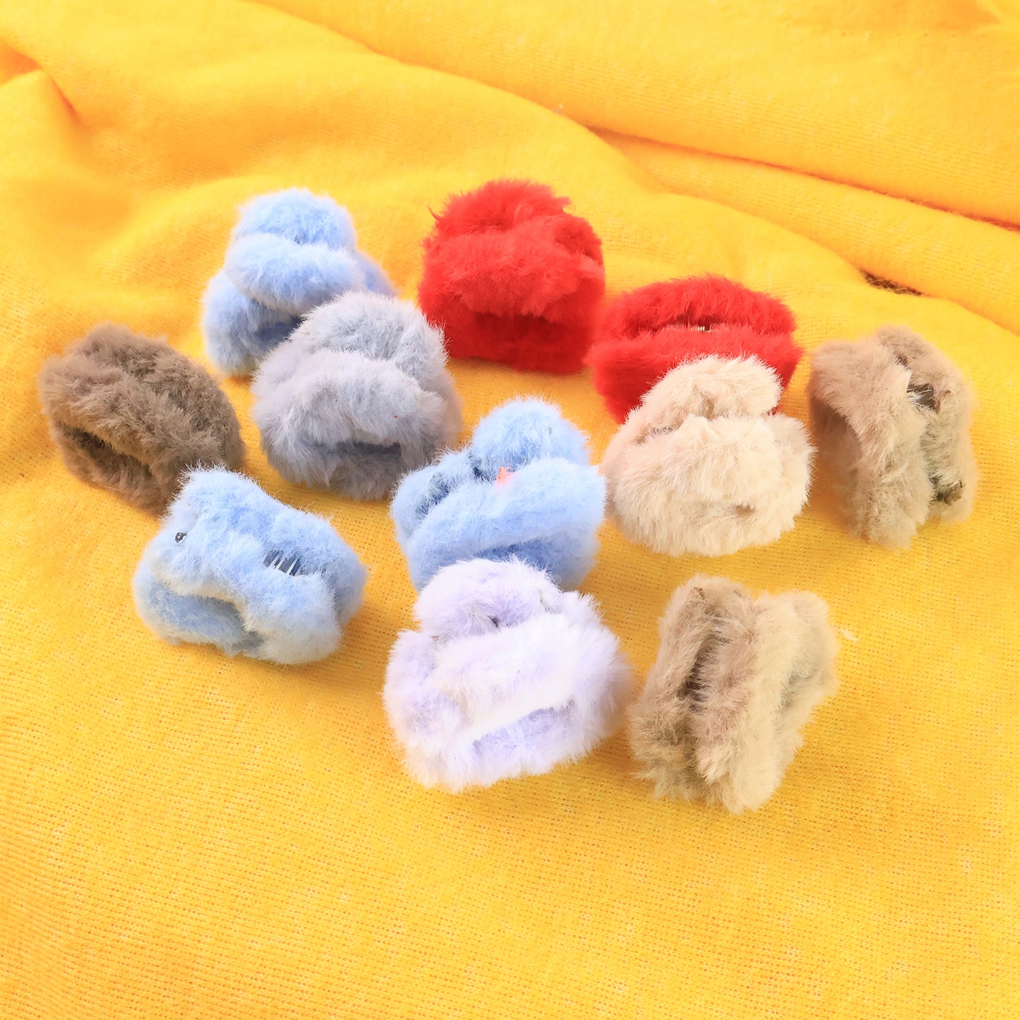 Set of 12 small plastic fluffy hair claw clips from Wukusy, ideal for securing hair with stylish, colorful hair accessories.