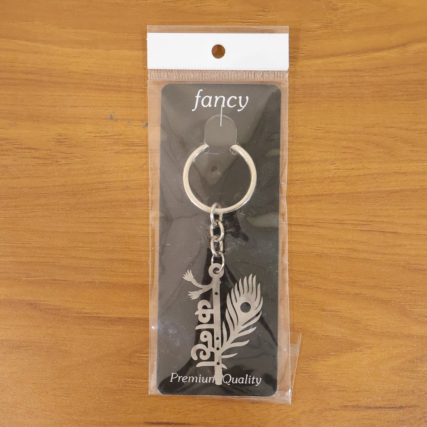 Wukusy Premium Metal Kanha keychain featuring a detailed Kanha figure on a sturdy metal loop.