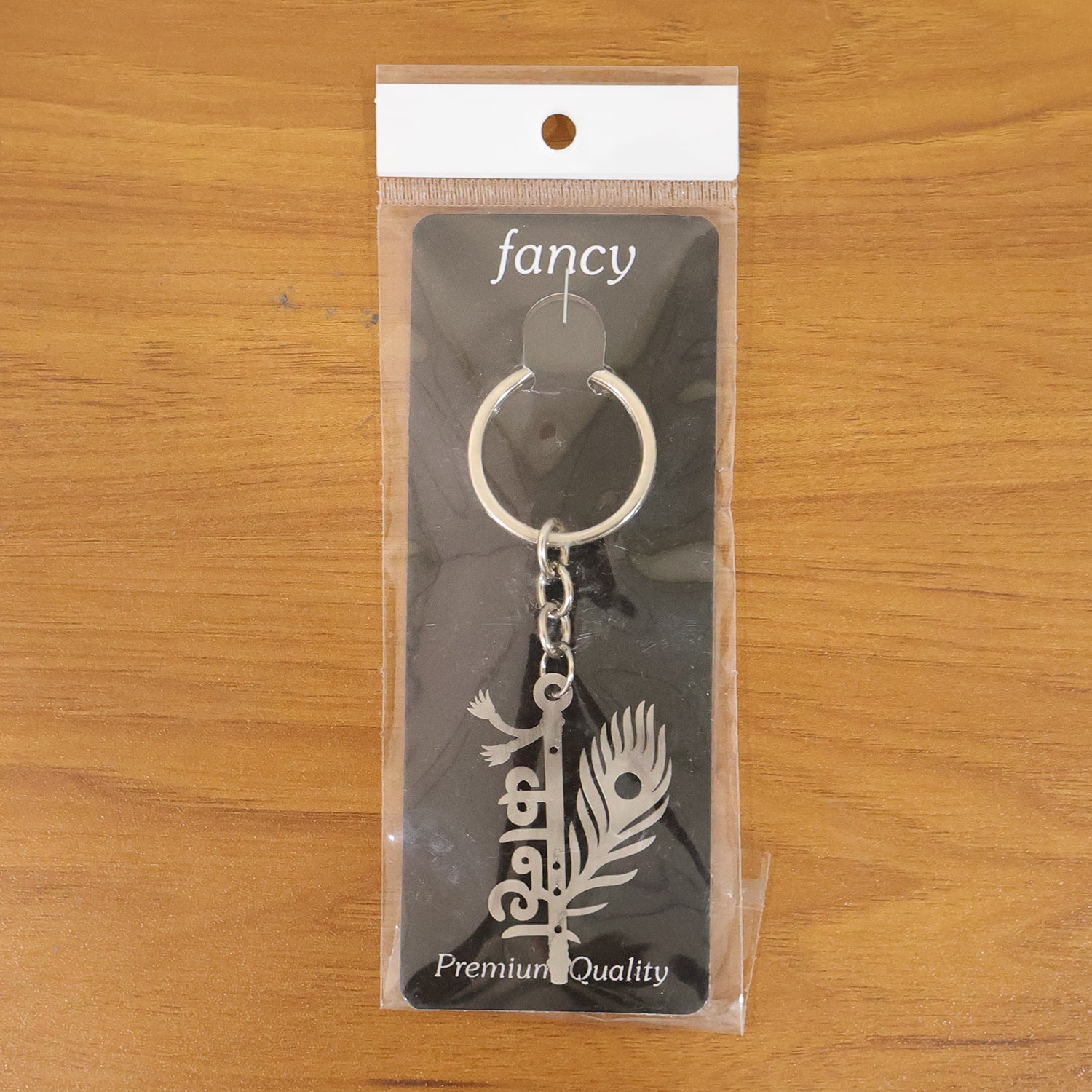 Wukusy Premium Metal Kanha keychain featuring a detailed Kanha figure on a sturdy metal loop.