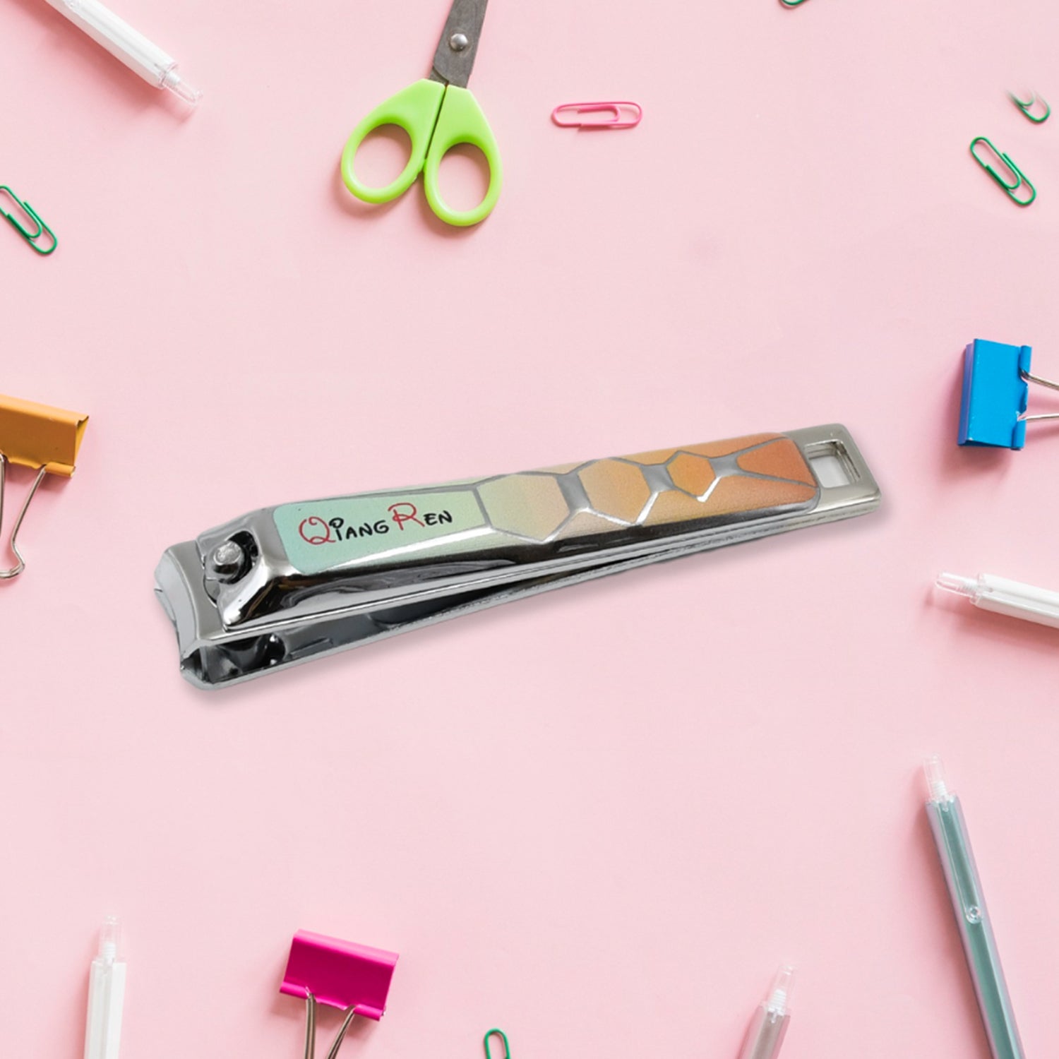 Wukusy stainless steel folding nail clippers with nail file, portable and large, displayed with a mix of design patterns for health care use.