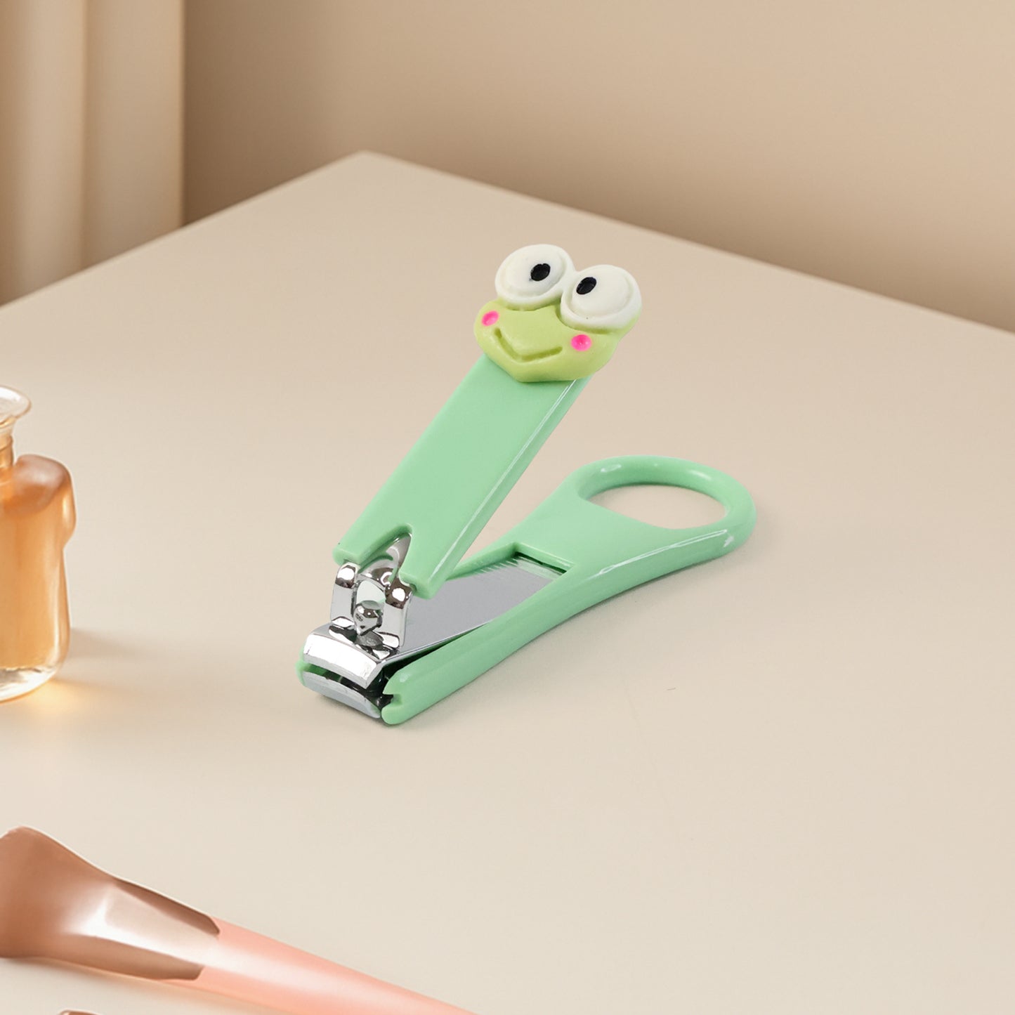 Wukusy cartoon nail clipper for kids with a playful design, featuring a colorful and cute character for gentle nail trimming.