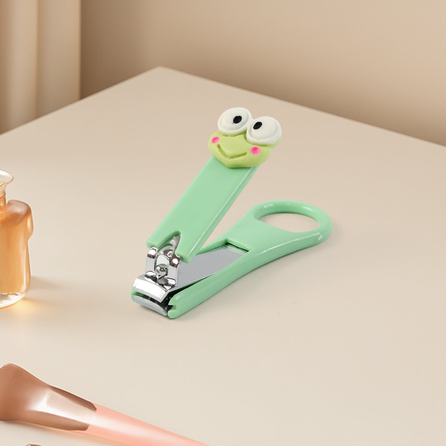 Wukusy cartoon nail clipper for kids with a playful design, featuring a colorful and cute character for gentle nail trimming.