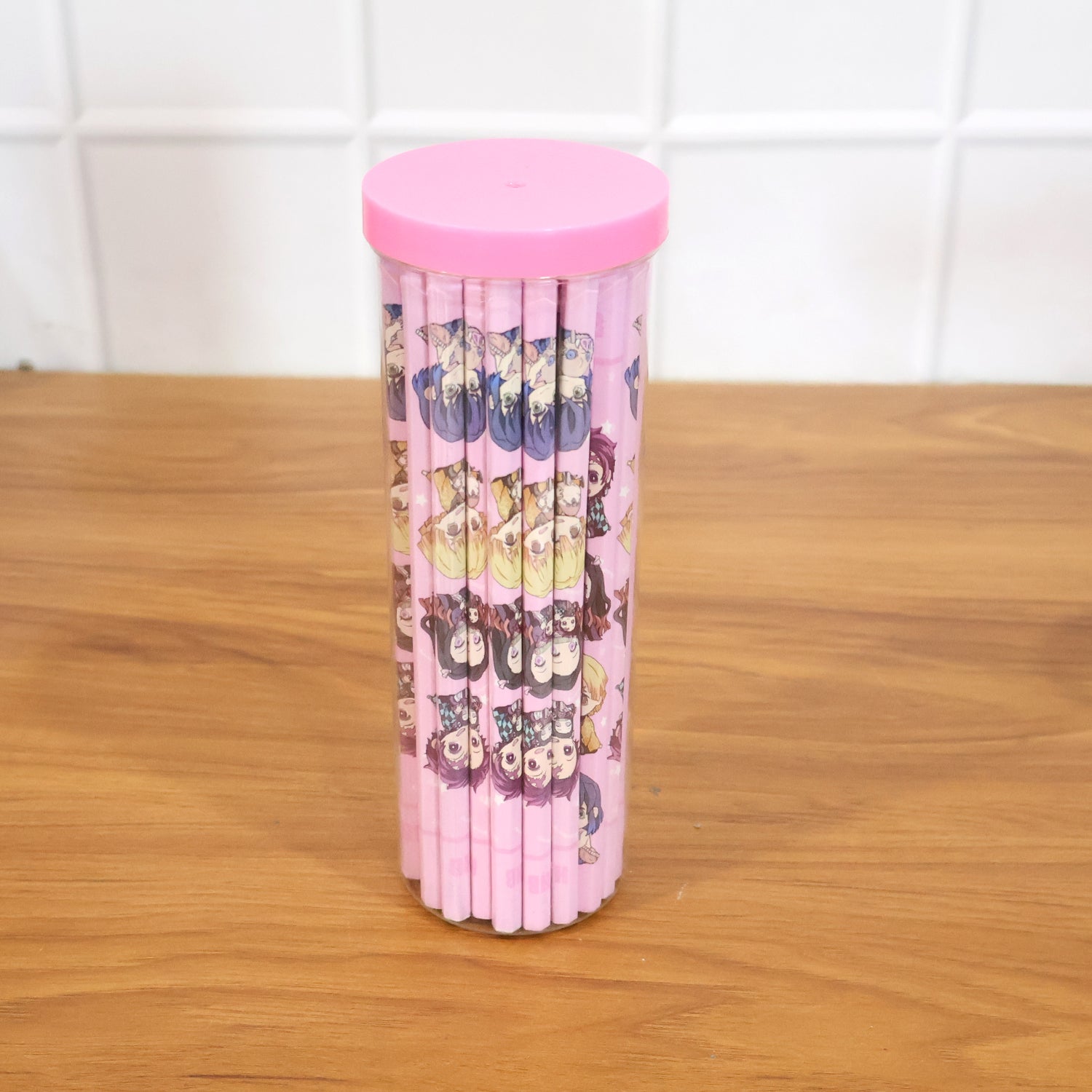 Set of 50 cartoon printed wooden pencils by Wukusy, featuring colorful, playful designs, perfect for drawing and writing.