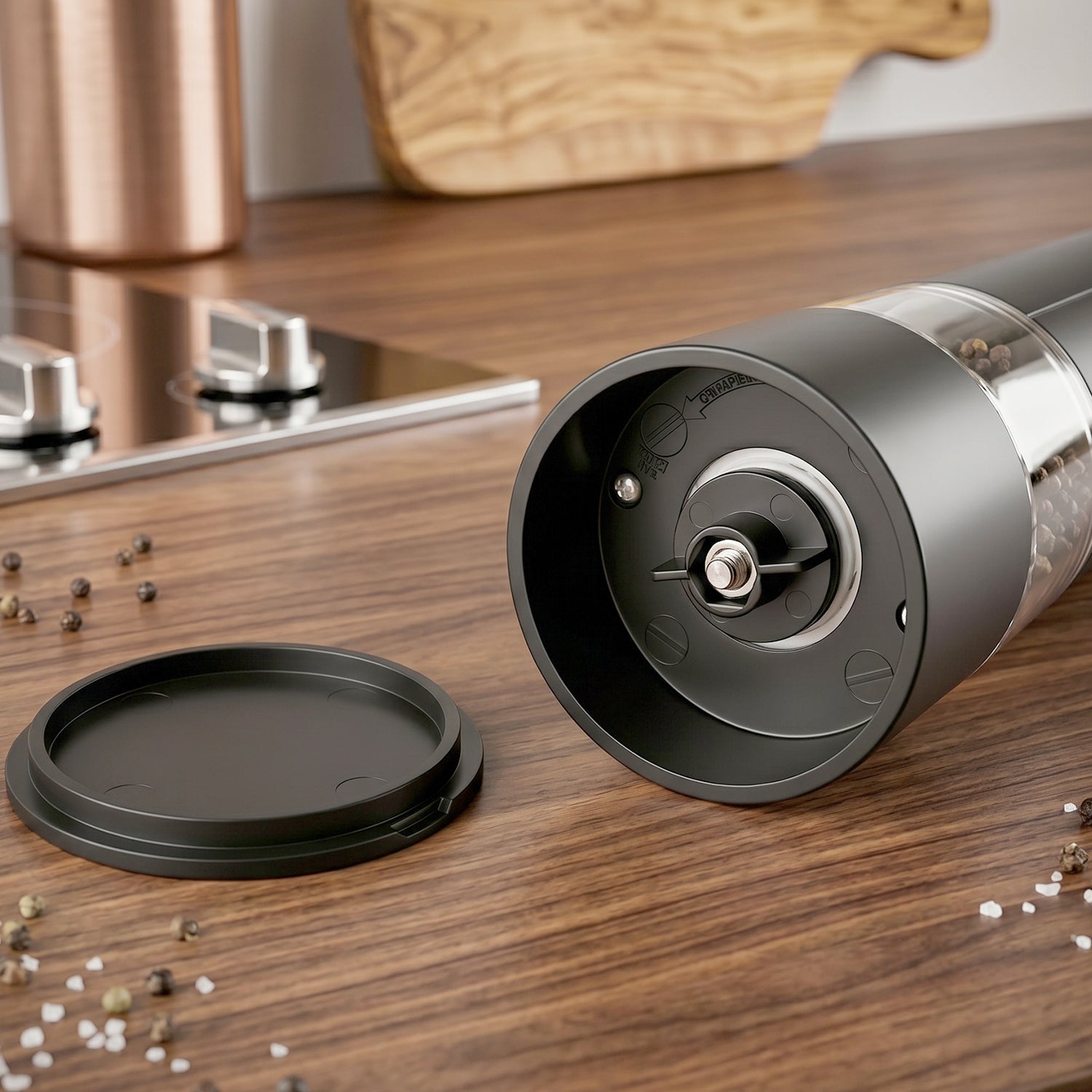 Wukusy electric pepper grinder with USB rechargeable design and one-touch operation, showing the sleek black grinder with a clear spice chamber.