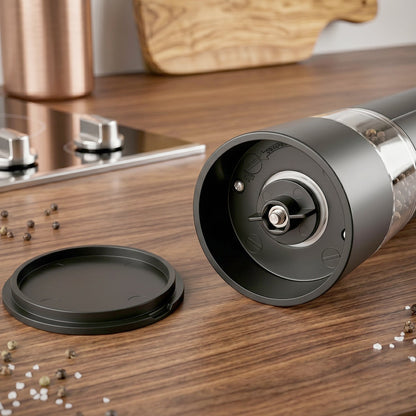 Wukusy electric pepper grinder with USB rechargeable design and one-touch operation, showing the sleek black grinder with a clear spice chamber.