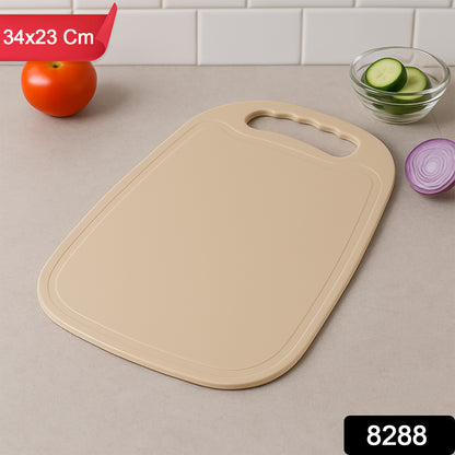 Wukusy durable plastic chopping board measuring 34x23 cm, suitable for home kitchen food preparation.
